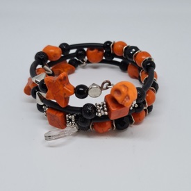 Orange och svart armband